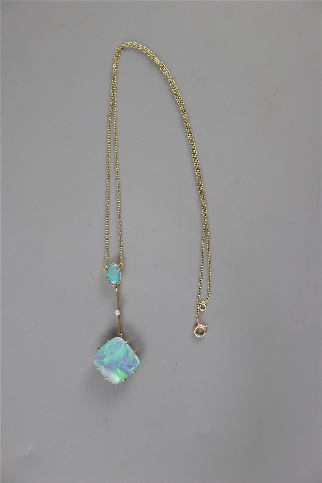 An early 20th century 15ct gold, diamond and two stone opal set drop pendant necklace,